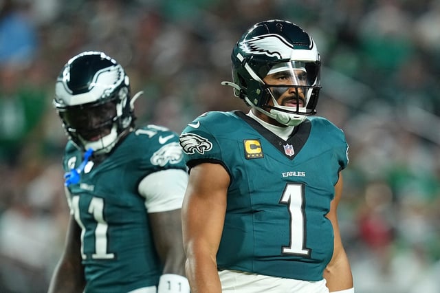 Jalen Hurts #1 and A.J. Brown #11 of the Philadelphia Eagles look on against the Dallas Cowboys at Lincoln Financial Field on September 04, 2025 in Philadelphia, Pennsylvania.
