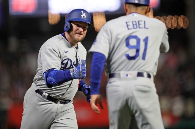Max Muncy and the Dodgers will face the Phillies in Game 2 of a National League Division Series at 3 p.m. Monday. (TBS, TruTV)