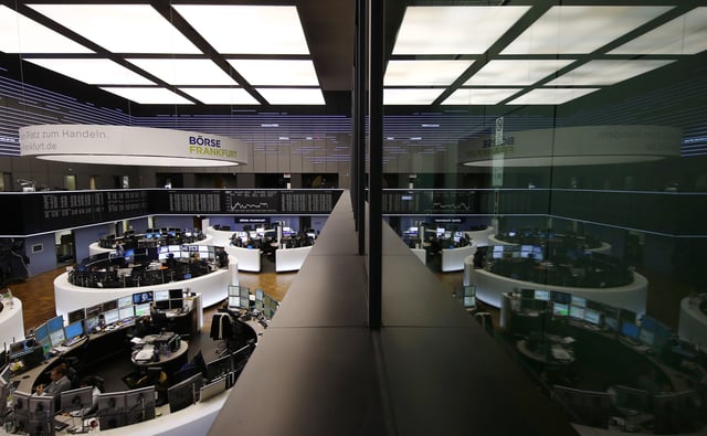 The trading room of Frankfurt's stock exchange (Boerse Frankfurt) is reflected in the window of the visitor's gallery during afternoon trading session in Frankfurt Germany, February 23, 2016.    REUTERS/Kai Pfaffenbach