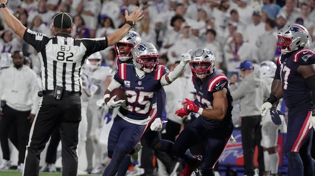 New England Patriots cornerback Marcus Jones celebrates his interception during second half action at Highmark Stadium in Orchard Park on Oct. 5, 2025.