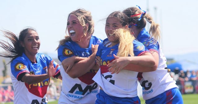 The Newcastle Yowies celebrate one of their three tries in this afternoon's Koori Knockout grand final. Picture by Zac Lowe.