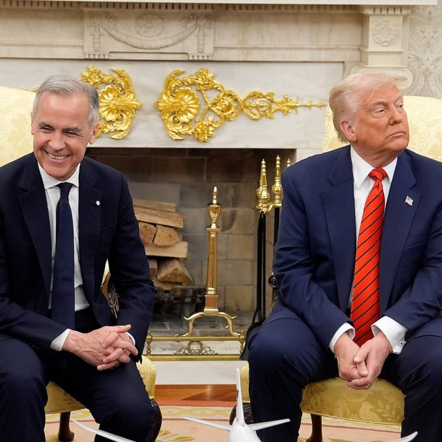 Prime Minister Mark Carney and U.S. President Donald Trump engage in a meeting at the White House in Washington, D.C., Tuesday, May 6, 2025. THE CANADIAN PRESS/Adrian Wyld