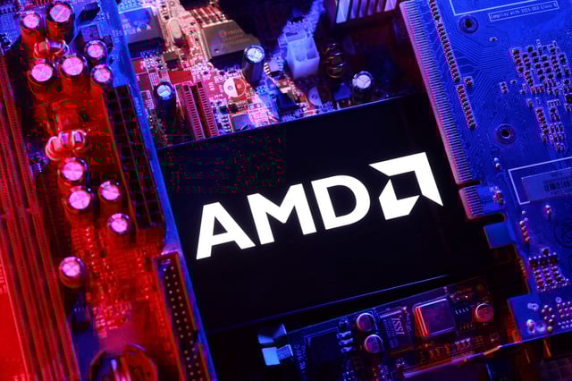 An AMD logo and a computer motherboard appear in this illustration taken August 25, 2025. REUTERS/Dado Ruvic/Illustration