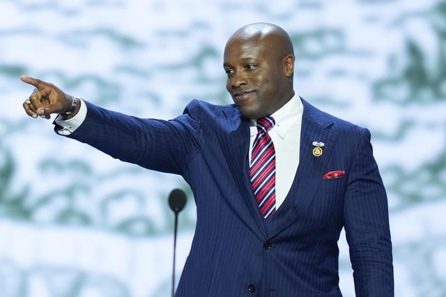 Rep. Wesley Hunt, R-Texas, gestures as he walks to the podium to speak on the first day of the Republican National Convention, Monday, July 15, 2024, in Milwaukee.