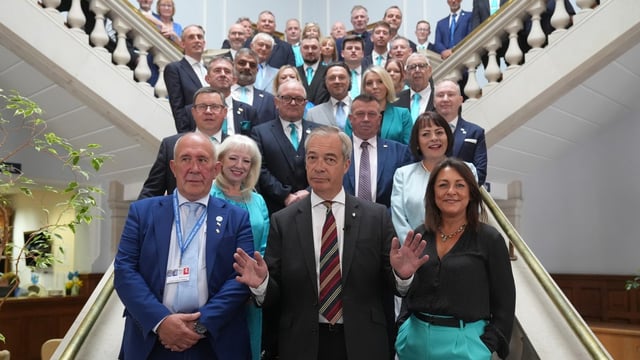 Nigel Farage with councillors from Kent county council in July. The local authority has been described as a test bed for his party’s national policies