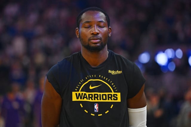 Golden State Warriors’ Jonathan Kuminga (1) stands on the court during the national anthem before their preseason NBA game at Chase Center in San Francisco, Calif., on Sunday, Oct. 5, 2025. (Jose Carlos Fajardo/Bay Area News Group)