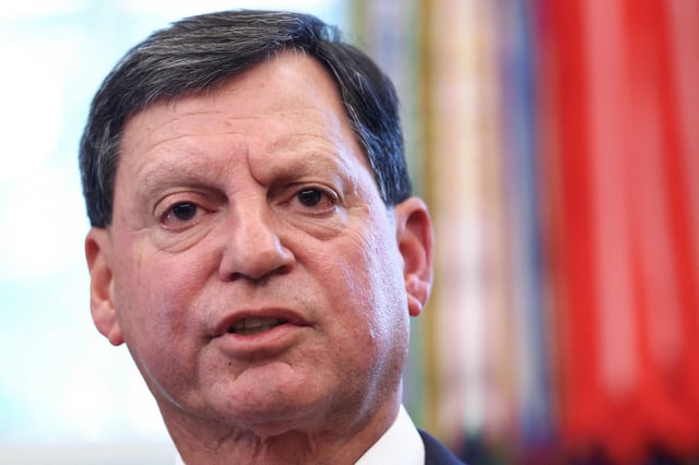 Commissioner of the U.S. Social Security Administration Frank Bisignano speaks, while with U.S. President Donald Trump (not pictured) in the Oval Office at the White House in Washington, D.C., U.S., August 14, 2025. REUTERS/Kevin Lamarque