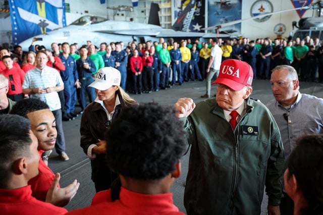 President Donald Trump and first lady Melania Trump visit the aircraft carrier USS George H.W. Bush, off the coast of Norfolk, Virginia, U.S. October 5, 2025. REUTERS/Jonathan Ernst