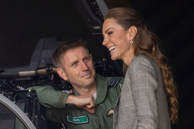 Princess Kate is seen smiling as a pilot shows her a Typhoon aircraft during a visit to R.A.F. Coningsby in Lincolnshire, on October 2, 2025.