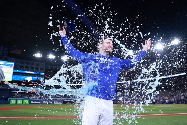 TORONTO, ONTARIO - OCTOBER 05: Trey Yesavage #39 of the Toronto Blue Jays celebrates with a Gatorade bath after winning game two of the American League Division Series against the New York Yankees at Rogers Centre on October 05, 2025 in Toronto, Ontario. (Photo by Vaughn Ridley/Getty Images)