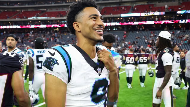 Aug 16, 2025; Houston, Texas, USA; Carolina Panthers quarterback Bryce Young (9) smiles on the field after the game against the Houston Texans at NRG Stadium. Mandatory Credit: Troy Taormina-Imagn Images