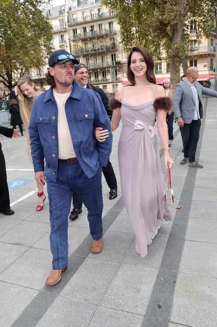 Jeremy Dufrene and Lana Del Rey attend the Valentino show as part of Paris Fashion Week on Oct. 5, 2025, in Paris.