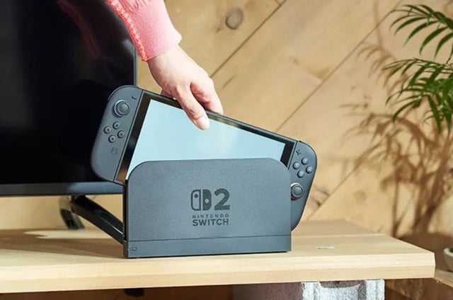 Una consola Nintendo Switch 2 en la base que permite vincularla a un televisor 4K