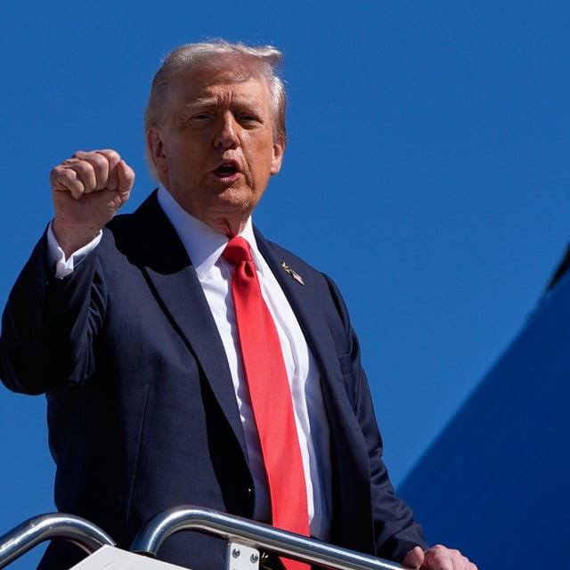 President Donald Trump gestures as he boards Air Force One, Sunday, Oct. 5, 2025, at Joint Base Andrews, Md., en route to Norfolk, Va. (AP Photo/Alex Brandon)