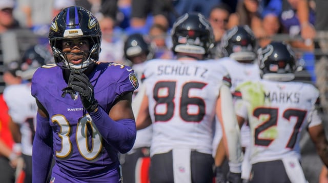 Baltimore Ravens safety Reuben Lowery III walks off after the defense failed to contain the Houston Texans as they celebrate their third touchdown of the game during the second quarter of NFL football. (Karl Merton Ferron/Staff)