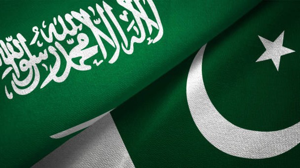 Pakistan and Saudi Arabia flag together realtions textile cloth fabric texture