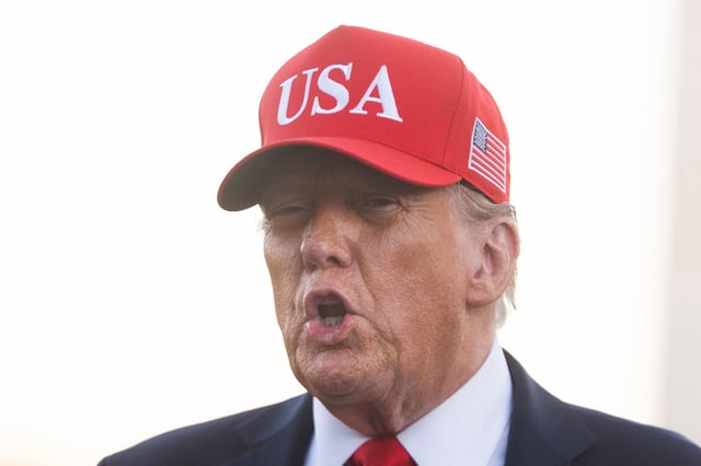 President Donald Trump speaks to reporters upon arrival on the south Lawn at the White House in Washington, Sunday, Oct. 5, 2025. (AP Photo/Manuel Balce Ceneta)