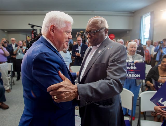 U.S. Rep. John Larson has raised more than $1 million for his re-election campaign. Here, he shakes hands with U.S. Rep. Jim Clyburn of South Carolina’s 6th Congressional District, as he makes his way to the stage to officially launch his re-election campaign at the I.A.M. Local Lodge 1746 in East Hartford, on Sept. 12, 2025. Clyburn is a major player among U.S. House Democrats and a longtime friend of Larson. (Aaron Flaum/Hartford Courant)