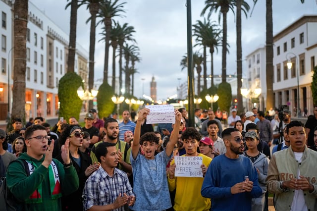 People take part in a youth led protest against corruption and calling for healthcare and education reform, in Rabat, Morocco, Saturday, Oct. 4, 2025. (AP Photo/Mosa'ab Elshamy)
