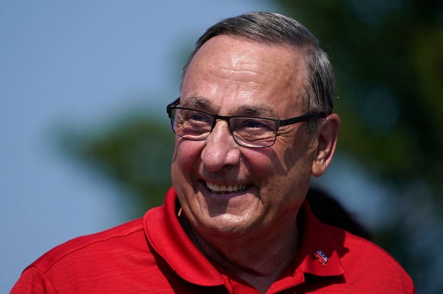 FILE - Former Gov. Paul LePage, a Republican gubernatorial candidate, marches in the State of Maine Bicentennial Parade, Aug. 21, 2021, in Lewiston, Maine. (AP Photo/Robert F. Bukaty, File)
