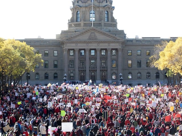  Thousands take part in a rally in support of teachers and public education outside the Alberta Legislature, in Edmonton Sunday Oct. 5, 2025.