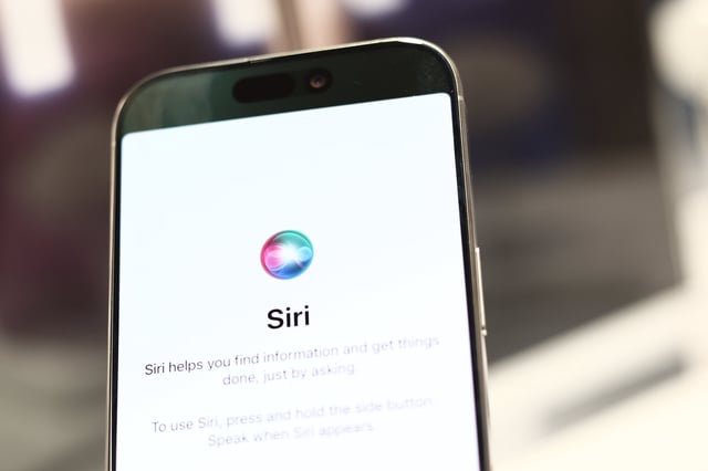 Siri logo is seen on a phone screen in this illustration photo taken in the store in Krakow, Poland on September 26, 2024. (Photo by Jakub Porzycki/NurPhoto via Getty Images)