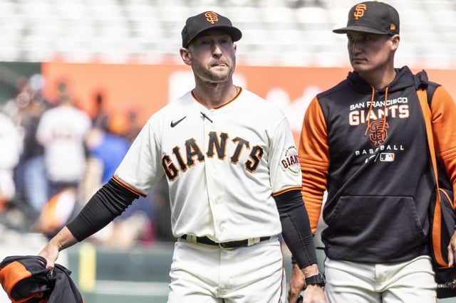 Craig Albernaz walks to the dugout in San Francisco, Calif. Wednesday, June 29, 2022, when was the bullpen coach for the Giants.