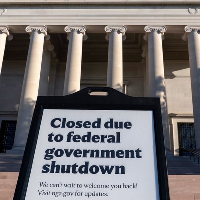 A sign that reads "Closed due to federal government shutdown," is seen outside of the National Gallery of Art on the 6th day of the government shutdown, in Washington, Monday, Oct. 6, 2025. (AP Photo/Jose Luis Magana)