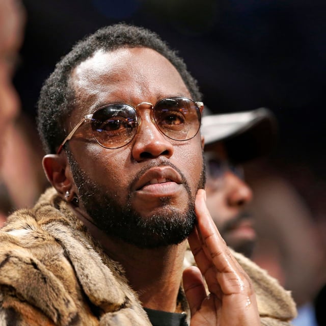 FILE - Sean "Diddy" Combs sits courtside in the second half of an NBA basketball game between the Brooklyn Nets and the New York Knicks, March 12, 2017, in New York. (AP Photo/Kathy Willens, File)