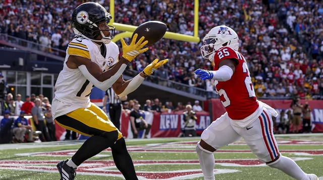 Sep 21, 2025; Foxborough, Massachusetts, USA; Pittsburgh Steelers wide receiver Calvin Austin III (19) scores the winning touchdown during the fourth quarter at Gillette Stadium. Mandatory Credit: Paul Rutherford-Imagn Images