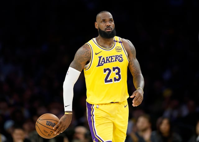 LOS ANGELES, CALIFORNIA - APRIL 30: LeBron James #23 of the Los Angeles Lakers tosses the ball back during a 103-96 loss to the Minnesota Timberwolves in Game Five of the Western Conference First Round NBA Playoffs at Crypto.com Arena on April 30, 2025 in Los Angeles, California.  NOTE TO USER: User expressly acknowledges and agrees that, by downloading and or using this photograph, User is consenting to the terms and conditions of the Getty Images License Agreement. (Photo by Harry How/Getty Images)