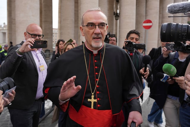 FILE - Cardinal Pierbattista Pizzaballa arrives for a college of cardinals' meeting at the Vatican, April 24, 2025. (AP Photo/Andrew Medichini, File)