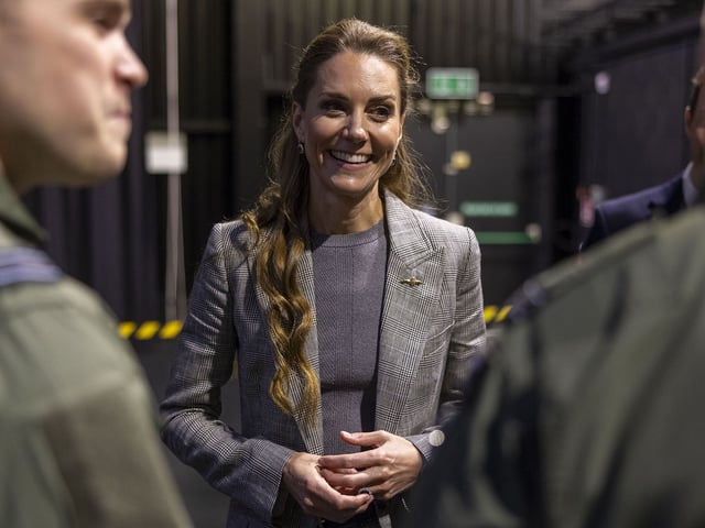CONINGSBY, ENGLAND - OCTOBER 2: Catherine, Princess of Wales, Royal Honorary Air Commodore, meets Quick Reaction Alert personnel based at RAF Coningsby in Lincolnshire during her first official engagement at the station, on October 2, 2025 in Coningsby, England. During the visit, Her Royal Highness learned about the station's operational role, met Quick Reaction Alert personnel, viewed a Typhoon aircraft, and toured the new Typhoon Future Synthetic Training facility, and also met families of personnel serving at the base. (Photo by James Glossop - WPA Pool/Getty Images)