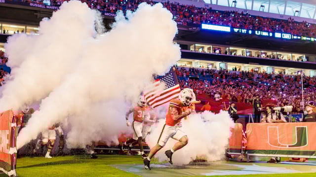 Miami Hurricanes wide receiver Xavier Restrepo runs onto the field to face off against Virginia Tech at Hard Rock Stadium on Friday, Sept. 27. Restrepo became Miami's all-time leading receiving on Saturday. (Keira Arimenta/Contributor)
