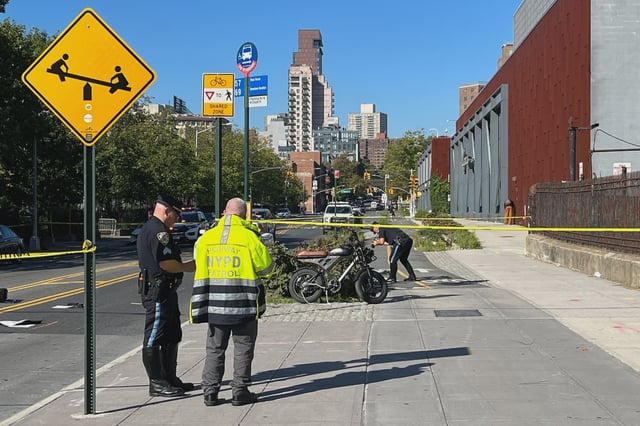 Pedestrians have to cross a busy cycling path in order to get to the bus stop on Flushing Avenue where a 60-year-old woman was killed in an e-bike crash on Monday.