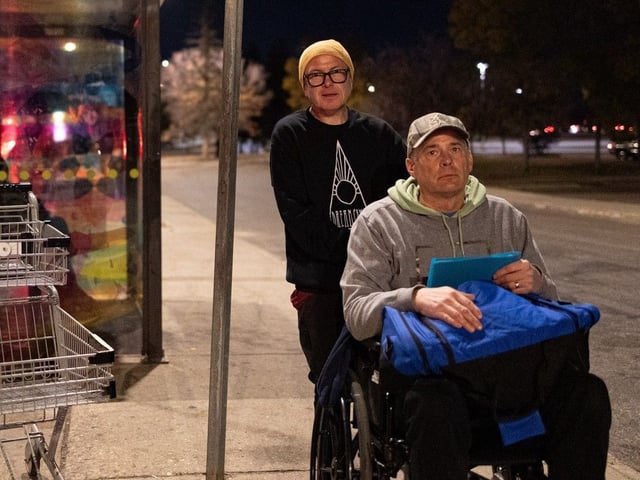 John McGettigan and police chief Cam McBride navigate the transit system to get closer to their assigned sleeping location at the STC Wellness Centre, while taking part in the Sanctum 36 Hour Challenge.