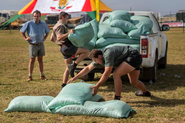 FILE - Farmers participate in a truck loading competition at the Nampo agricultural fair, one of the largest in the southern hemisphere, near Bothaville, South Africa, May 15, 2025. (AP Photo/Jerome Delay, File)