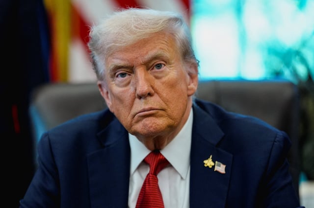 U.S. President Donald Trump attends an event to sign an executive order authorizing the construction of an access road to the Ambler mining district in Alaska, at the White House, in Washington, D.C., U.S., October 6, 2025. REUTERS/Kent Nishimura