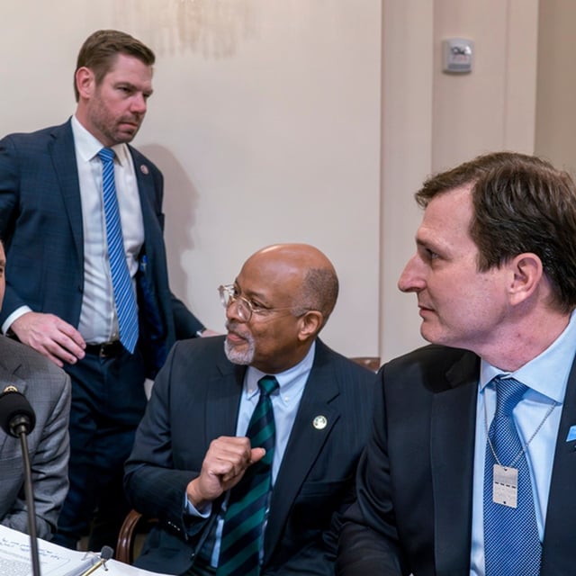 Democratic members of the House Homeland Security Committee, from left, Rep. Seth Magaziner, D-R.I., Rep. Eric Swalwell, D-Calif., Rep. Glenn Ivey, D-Md., and Rep. Dan Goldman, D-N.Y., meet during a break as Republicans move to impeach Secretary of Homeland Security Alejandro Mayorkas over the crisis at the U.S.-Mexico border, at the Capitol in Washington, Tuesday, Jan. 30, 2024.  (AP Photo/J. Scott Applewhite)