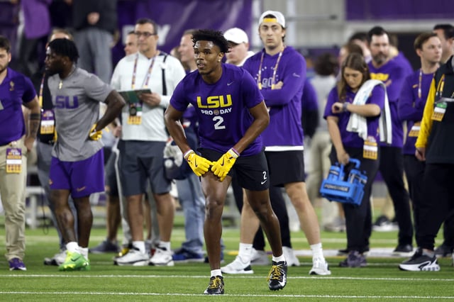 BATON ROUGE, LOUISIANA - MARCH 26: Kyren Lacy of the LSU Tigers participates in drills during LSU Pro Day at LSU Football Indoor Practice Facility on March 26, 2025 in Baton Rouge, Louisiana. (Photo by Tyler Kaufman/Getty Images)