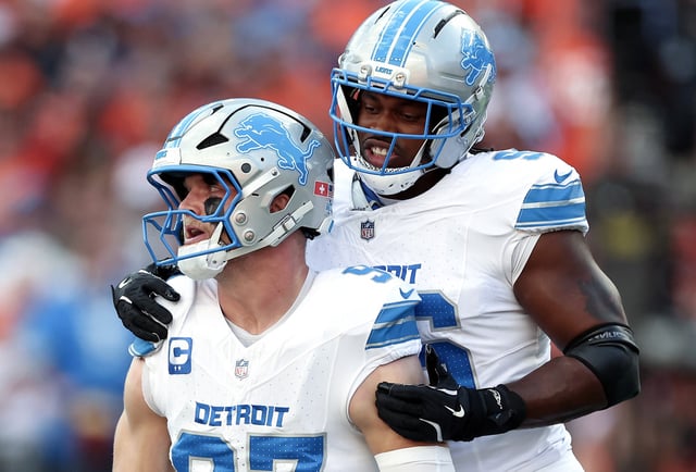 Aidan Hutchinson #97 and Terrion Arnold #6 of the Detroit Lions celebrate a sack during the first half against the Cincinnati Bengals at Paycor Stadium on October 05, 2025 in Cincinnati, Ohio.