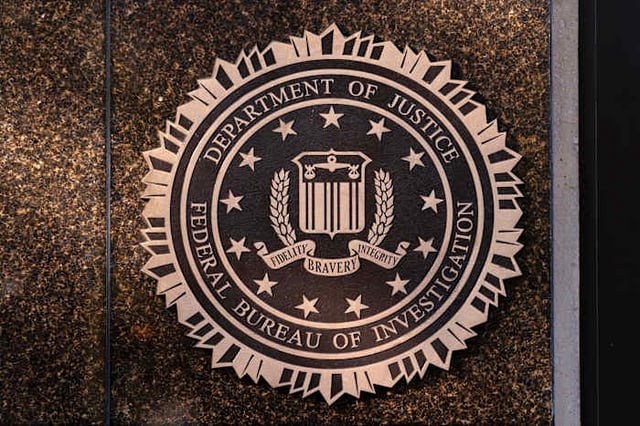 FILE - The seal of The Federal Bureau of Investigation is seen on the Headquarters in Washington, Nov. 18, 2024. (AP Photo/Jose Luis Magana, File)
