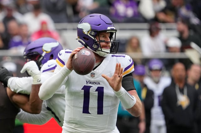 Oct 5, 2025; Tottenham, United Kingdom; Minnesota Vikings quarterback Carson Wentz (11) looks to pass the ball against the Cleveland Browns during the third quarter of an NFL International Series game at Tottenham Hotspur Stadium. Mandatory Credit: Kirby Lee-Imagn Images/ File Photo