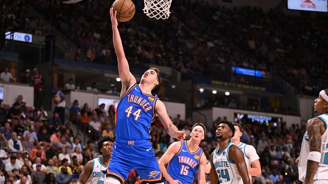 Thunder guard Nikola Topic (44) lays up a shot against the Charlotte Hornets in the first quarter at North Charleston Coliseum