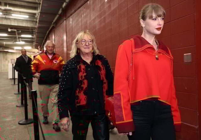 KANSAS CITY, MISSOURI - NOVEMBER 29:  Singer Taylor Swift walks into the stadium alongside Donna Kelce prior to the game between the Las Vegas Raiders and the Kansas City Chiefs at GEHA Field at Arrowhead Stadium on November 29, 2024 in Kansas City, Missouri. (Photo by Jamie Squire/Getty Images)