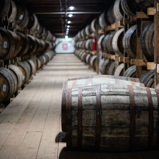 FILE - Barrels of bourbon are stacked in a barrel house at the Jim Beam Distillery on February 17, 2020, in Clermont, Kentucky. (Photo by Bryan Woolston/Getty Images)