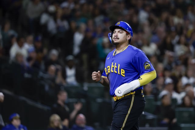 Sep 25, 2025; Seattle, Washington, USA; Seattle Mariners first baseman Josh Naylor (12) jogs to the dugout after scoring a run against the Colorado Rockies during the fourth inning at T-Mobile Park. Mandatory Credit: Joe Nicholson-Imagn Images/ File Photo
