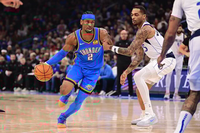 OKLAHOMA CITY, OKLAHOMA - JANUARY 23: Shai Gilgeous-Alexander #2 of the Oklahoma City Thunder handles the ball during the first half against the Dallas Mavericks at Paycom Center on January 23, 2025 in Oklahoma City, Oklahoma. NOTE TO USER: User expressly acknowledges and agrees that, by downloading and or using this photograph, User is consenting to the terms and conditions of the Getty Images License Agreement. (Photo by Joshua Gateley/Getty Images)
