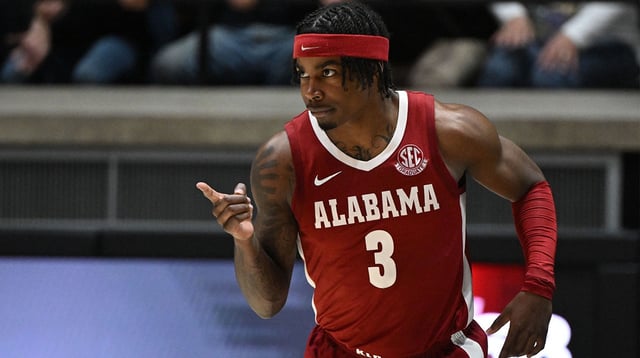Alabama Crimson Tide men's basketball guard Latrell Wrightsell Jr. (3) celebrates after making a basket during the second half against the Purdue Boilermakers at Mackey Arena.