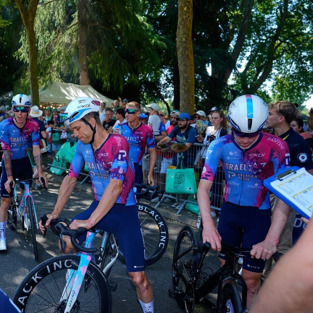 Israel - Premier Tech riders wait for the start of the ninth stage of the Tour de France cycling race over 174.1 kilometres (108 miles) with start in Chinon and finish in Chateauroux, France, Sunday, July 13, 2025. (AP Photo/Mosa'ab Elshamy)